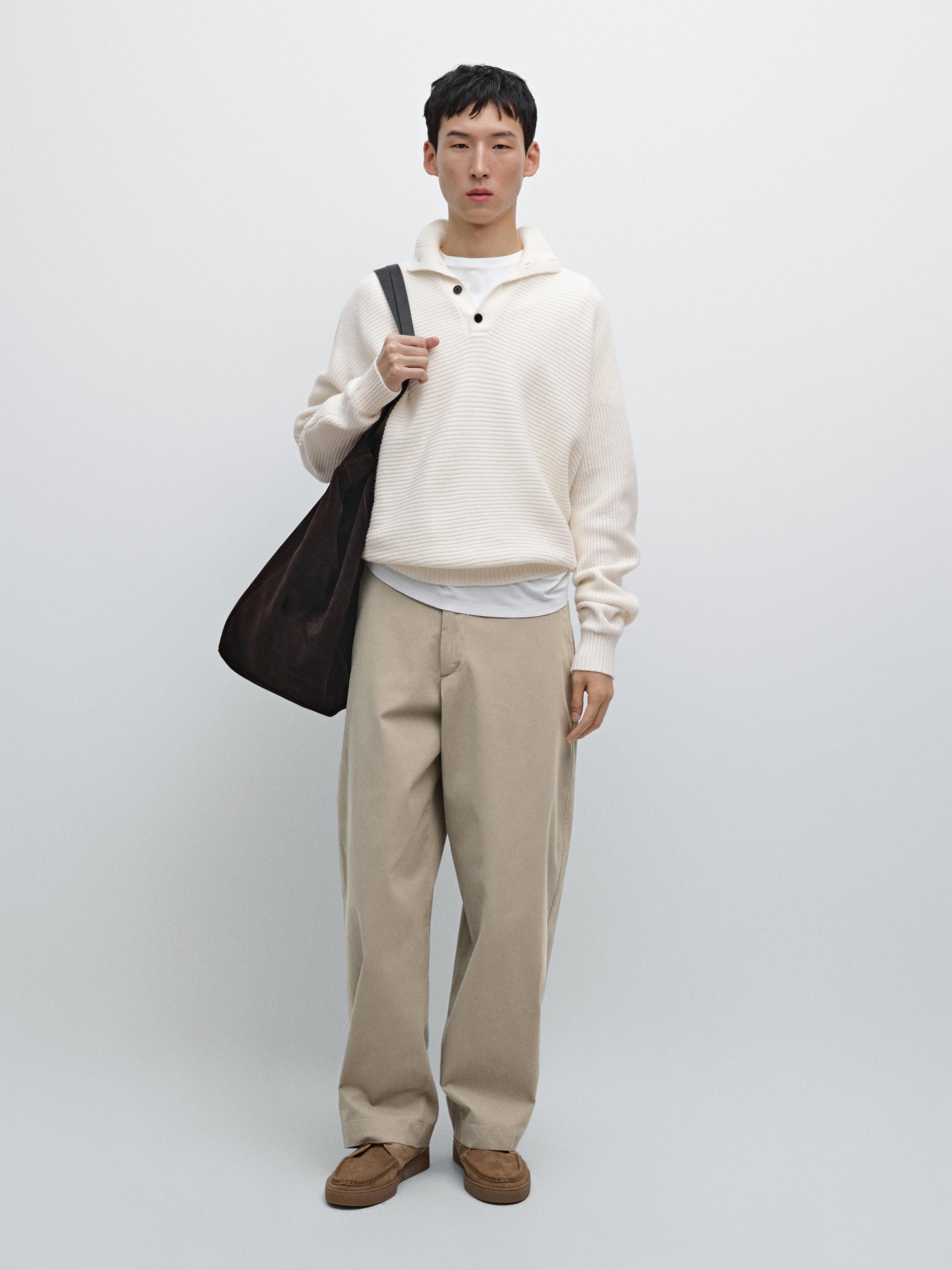 Knit sweater with mock button neck